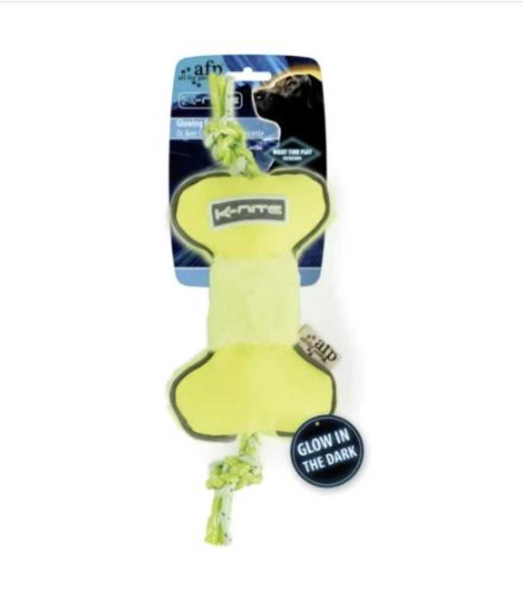 Dog toy with fluorescent edging